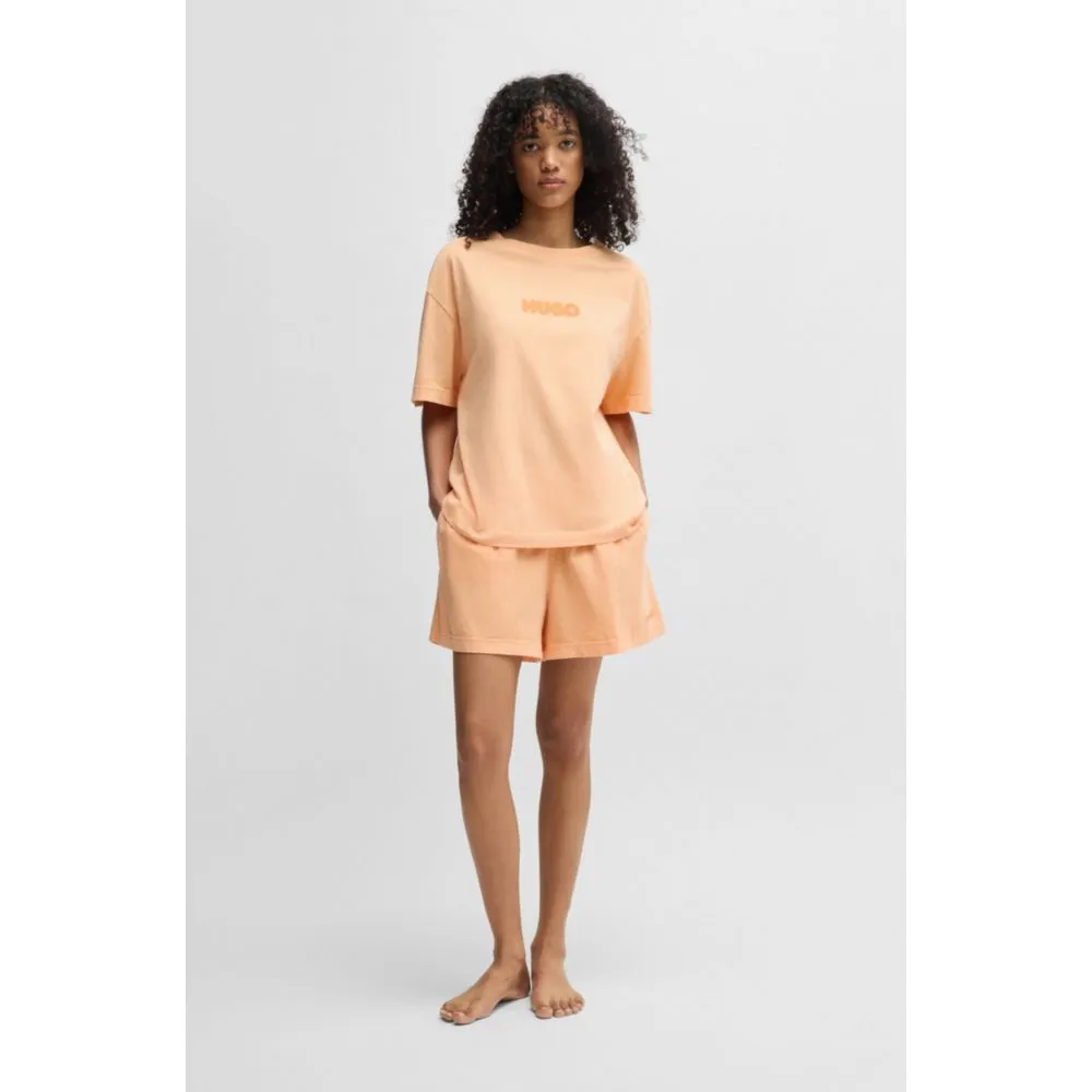 Relaxed-fit printed pajamas in cotton with blurred logos