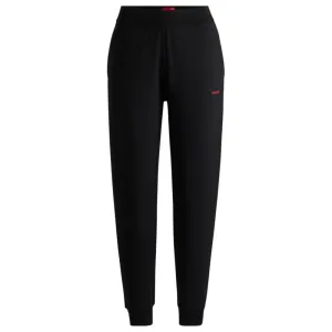 Relaxed-fit tracksuit bottoms with printed logo